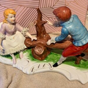Porcelain Figurine Pair - Boy and Girl on Log - Pastel Colors
